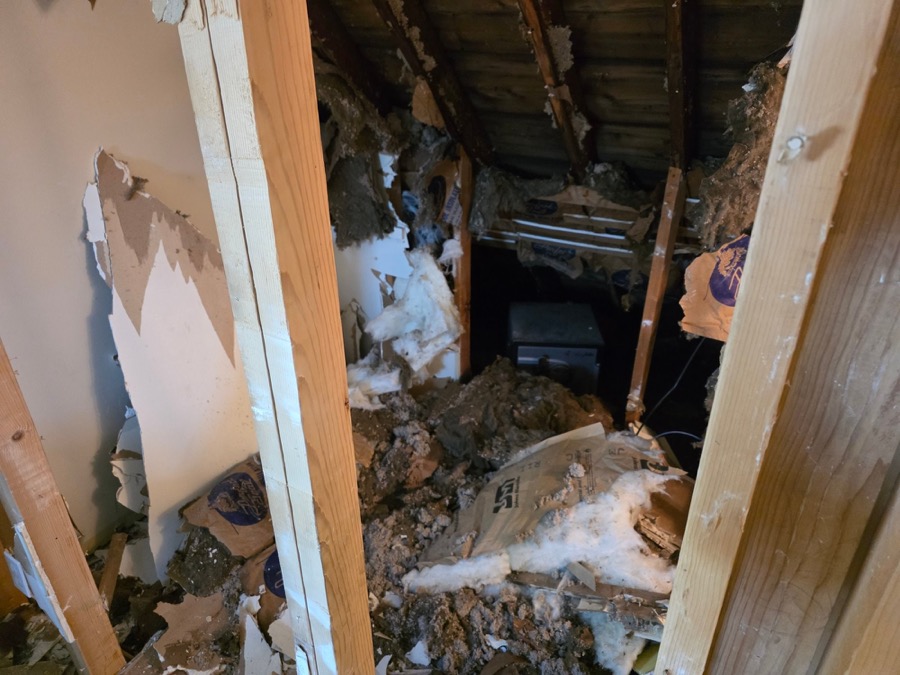 Ceiling torn out and hauled off during a gut job